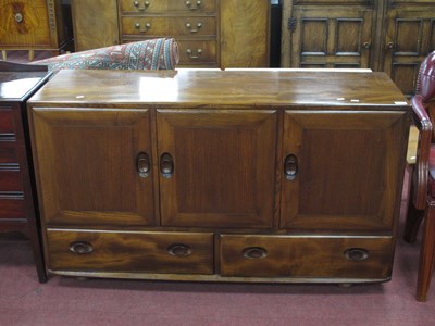 Lot 1542 - Ercol Sideboard, with oval handles to three...