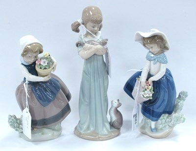 Lot 1238 - Lladro Figurines, to include Girl Cuddling Cat,...