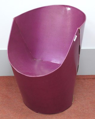 Lot 1509 - A purple flatpack bucket chair in the style of...