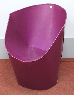 Lot 1508 - A purple flatpack bucket chair in the style of...