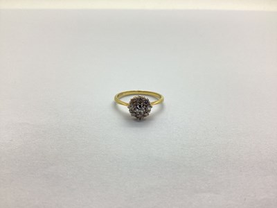 Lot 233 - A Diamond Cluster Ring, set with old and...