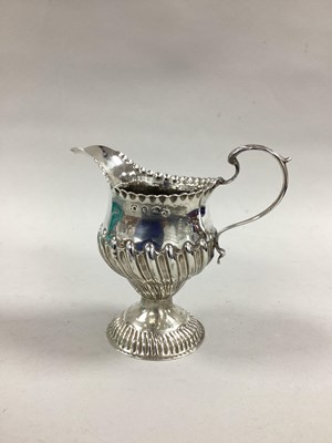 Lot 101 - A Georgian Hallmarked Silver Cream Jug,...