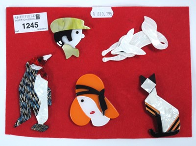 Lot 1245 - Five Modern Brooches.