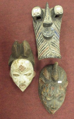 Lot 1311 - Three Painted African Masks.