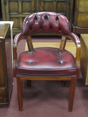 Lot 1543 - An Oxblood Leather Office Open Armchair, with...