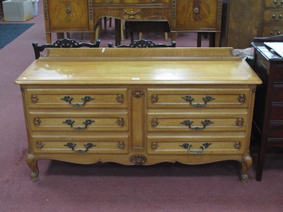 Lot 1538 - A French Style Oak Chest of Drawers, with...