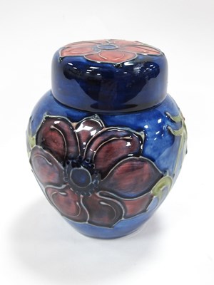 Lot 1195 - Moorcroft Anomonies Giner Jar, on blue...