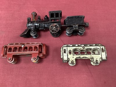 Lot 702 - An Outline American Cast Iron 'Floor Train'...