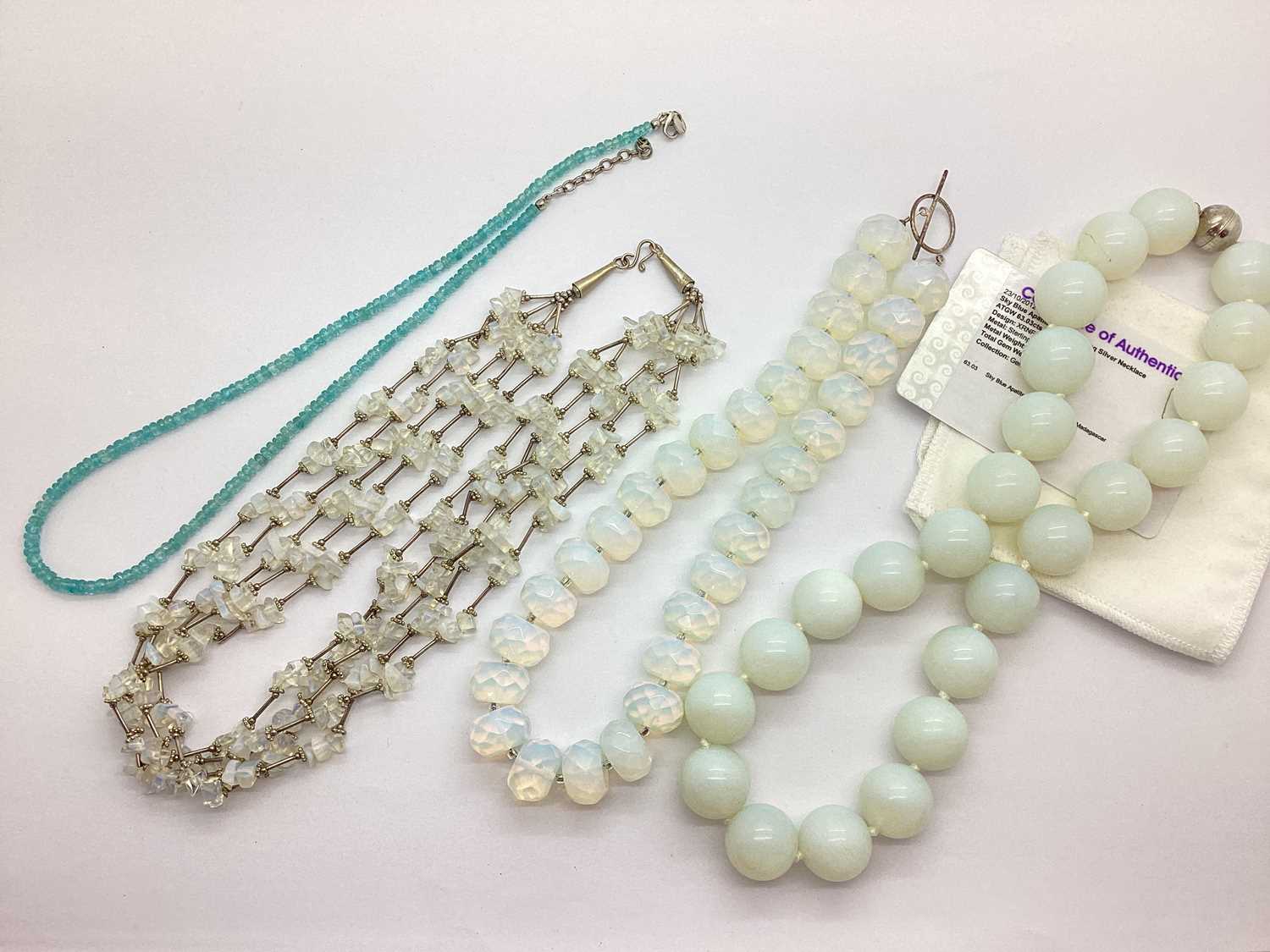 Lot 153 - A Modern TGGC Sky Blue Apatite Bead Necklace,...