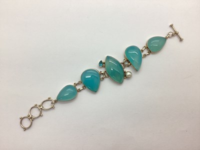 Lot 202 - A Polished Hardstone Bracelet of Panel Design,...