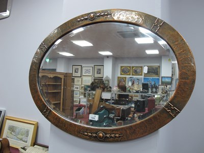 Lot 1524 - Oval Bevelled Wall Mirror, in beaten copper...