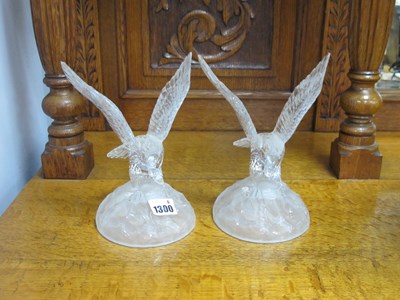 Lot 1300 - A Pair of Glass Crystal Eagle Figurines, on...