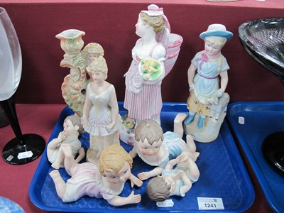 Lot 1241 - Four Piano Babies (one damaged). four...