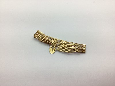 Lot 207 - A 9ct Gold Gate Link Style Bracelet, to heart...