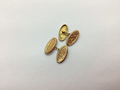 Lot 104 - A Pair of 9ct Gold Cufflinks, the foliate...