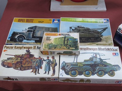 Lot 774 - Five plastic model kits, all with a military...