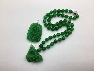 Lot 130 - A Modern Green Jade Bead Necklace, to magnetic...