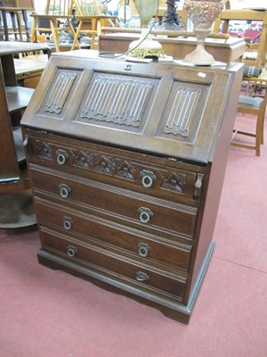 Lot 1556 - XX Century Oak Bureau, the fall front with...