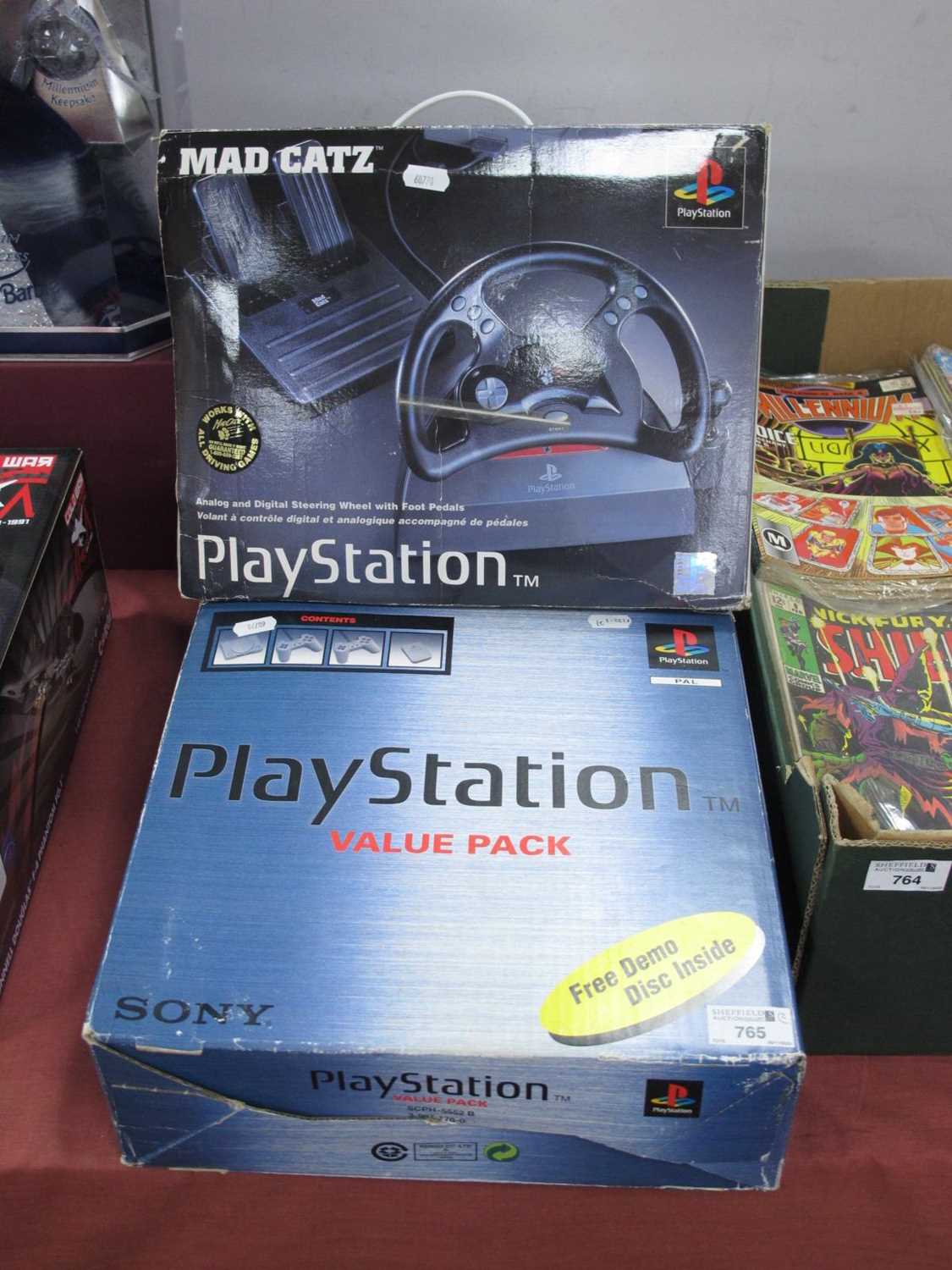 Lot 765 - A Sony Playstation One (PS1) games console...