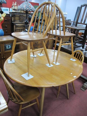 Lot 1577 - Ercol Drop Leaf Table, together with four...