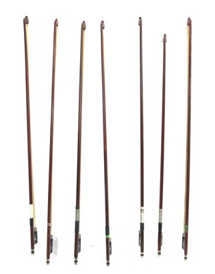 Lot 1326 - Seven Violin Bows, in various woods with...