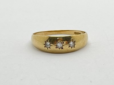 Lot 216 - A 9ct Gold Three Stone Ring, of gypsy style...