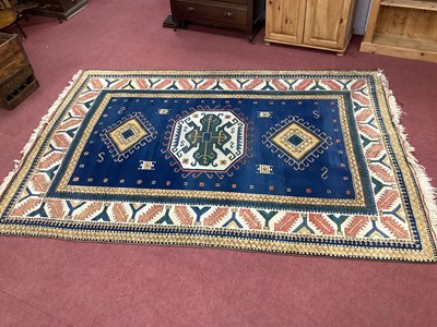 Lot 1554 - Middle Eastern Wool Tassled Carpet, with...