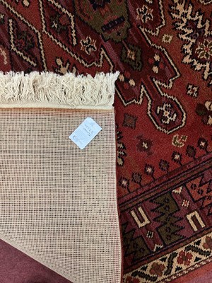 Lot 1578 - Adedis Kashmir Tassled Woold Rug, with four...