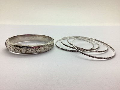 Lot 228 - A Hallmarked Silver Hinged Bangle, leaf scroll...