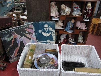 Lot 1076 - Eleven Pottery Dolls, in display case, records,...