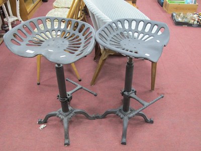 Lot 1617 - Pair of Cast Iron Tractor Seat Bar Stools,...