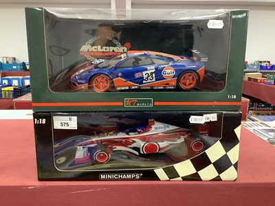 Lot 575 - Two 1:18th Scale Diecast Model Racing Cars...