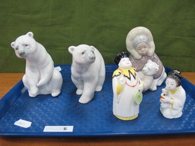 Lot 1294 - Lladro Eskimo Girl with Polar Bear, and two...