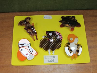 Lot 1307 - Five Modern Brooches.