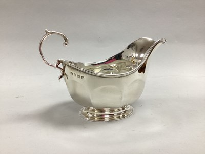 Lot 123 - A Hallmarked Silver Sauce Boat, Adie Bros,...