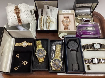 Lot 57 - Modern Ladies and Gent's Wristwatches,...