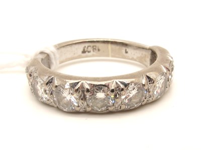 Lot 209 - A Diamond Set Half Eternity Band, set...