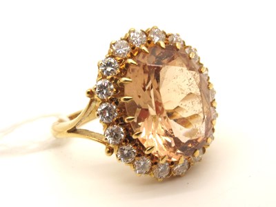 Lot 208 - An 18ct Gold Peach Topaz and Diamond Cluster...