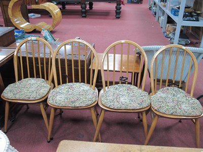 Lot 1618 - Ercol, Set of Four Light Wood Low Hoop top...