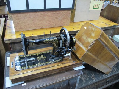 Lot 1565 - W J Harris & Co London Sewing Machine, in a...