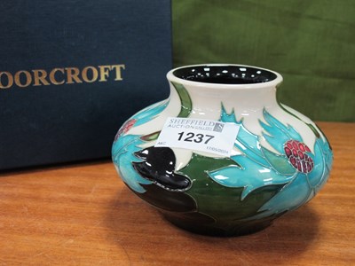 Lot 1237 - A Moorcroft Pottery 'Sea Holly' Pattern Squat...