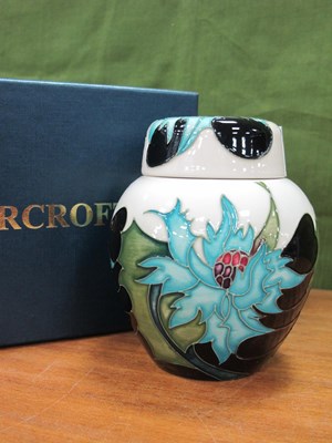 Lot 1236 - A Moorcroft Pottery 'Sea Holly' Pattern Ginger...