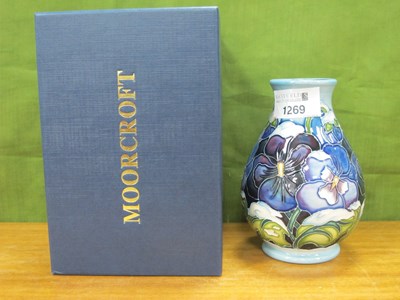 Lot 1269 - A Moorcroft Pottery 'Christmas Pansy' Design...