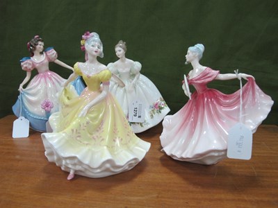 Lot 1279 - Royal Doulton Figurines 'Elaine', 18cm high,...