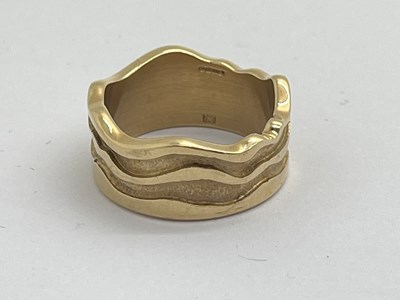 Lot 338 - A Modern 9ct Gold Wide Band Ring, of wavy...