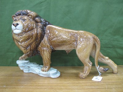 Lot 1263 - Goebel Lion, standing on a rocky outcrop, 47cm...