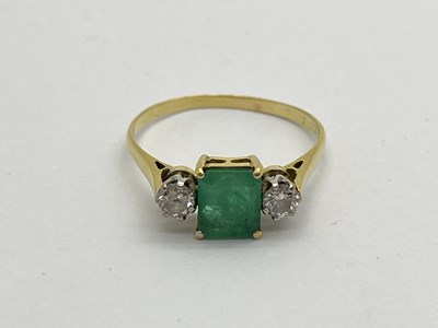 Lot 341 - An Emerald and Diamond Three Stone Ring,...