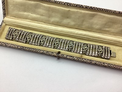 Lot 264 - An Art Deco Wide Panel Bracelet, with scroll...