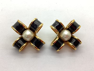 Lot 282 - Chanel; A Pair of Black Enamel and Imitation...