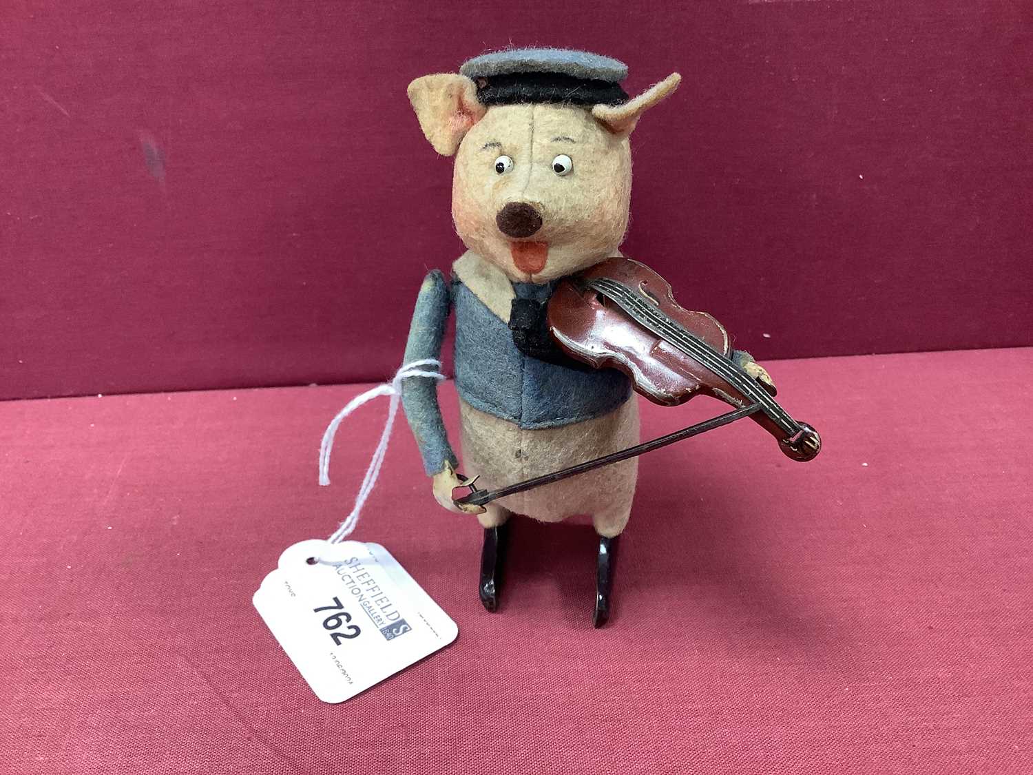 Lot 762 - Postwar Clockwork Dancing Pig Playing the...